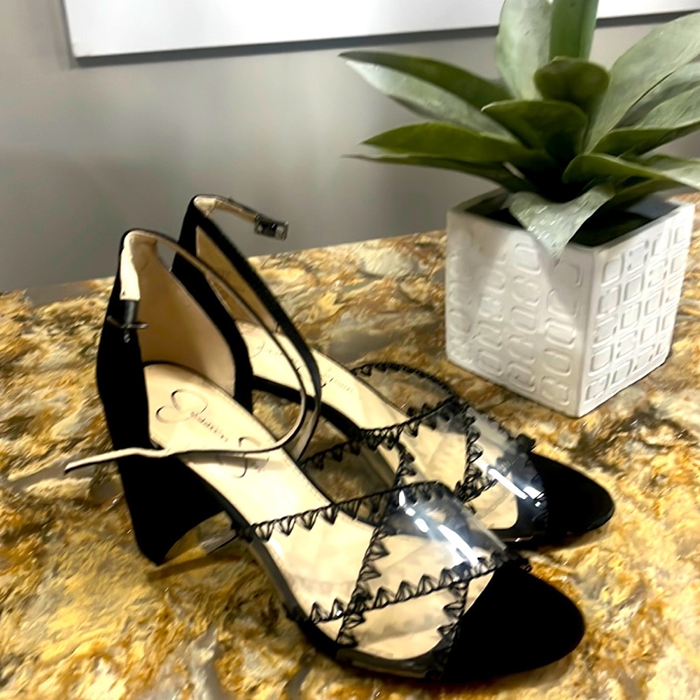 103. Beautiful black suede shoes with stitched detail clear front